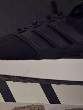 Black Athletic Sneaker with White Midsole